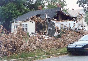 [Destroyed house]