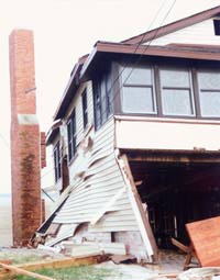 [Destroyed house]