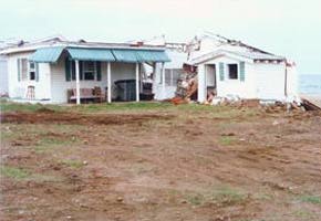 [Destroyed house]
